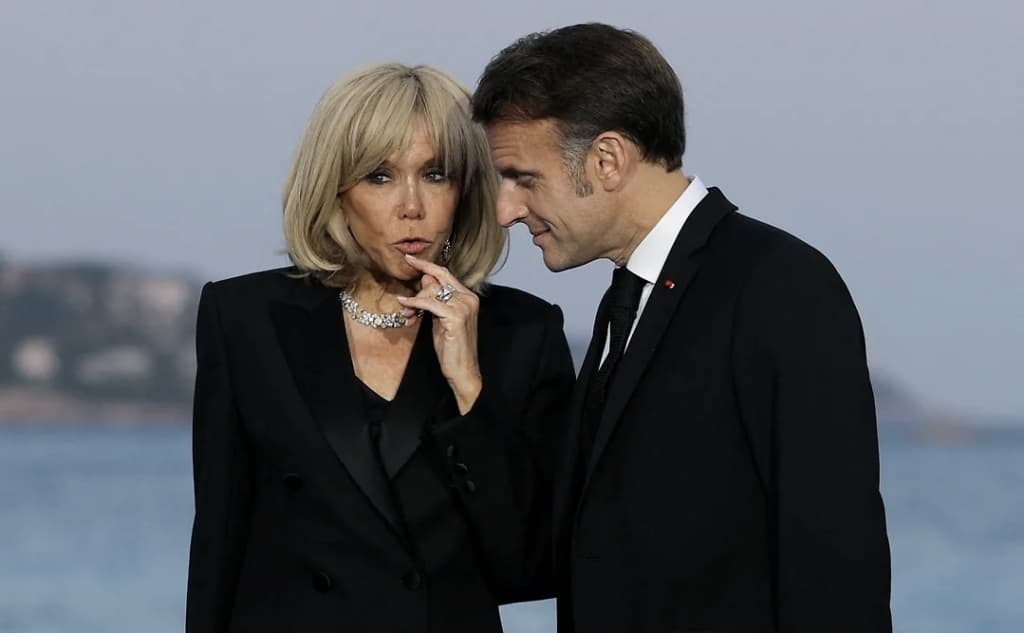 Makron rafiqasining erkak emasligini isbotlamoqchi