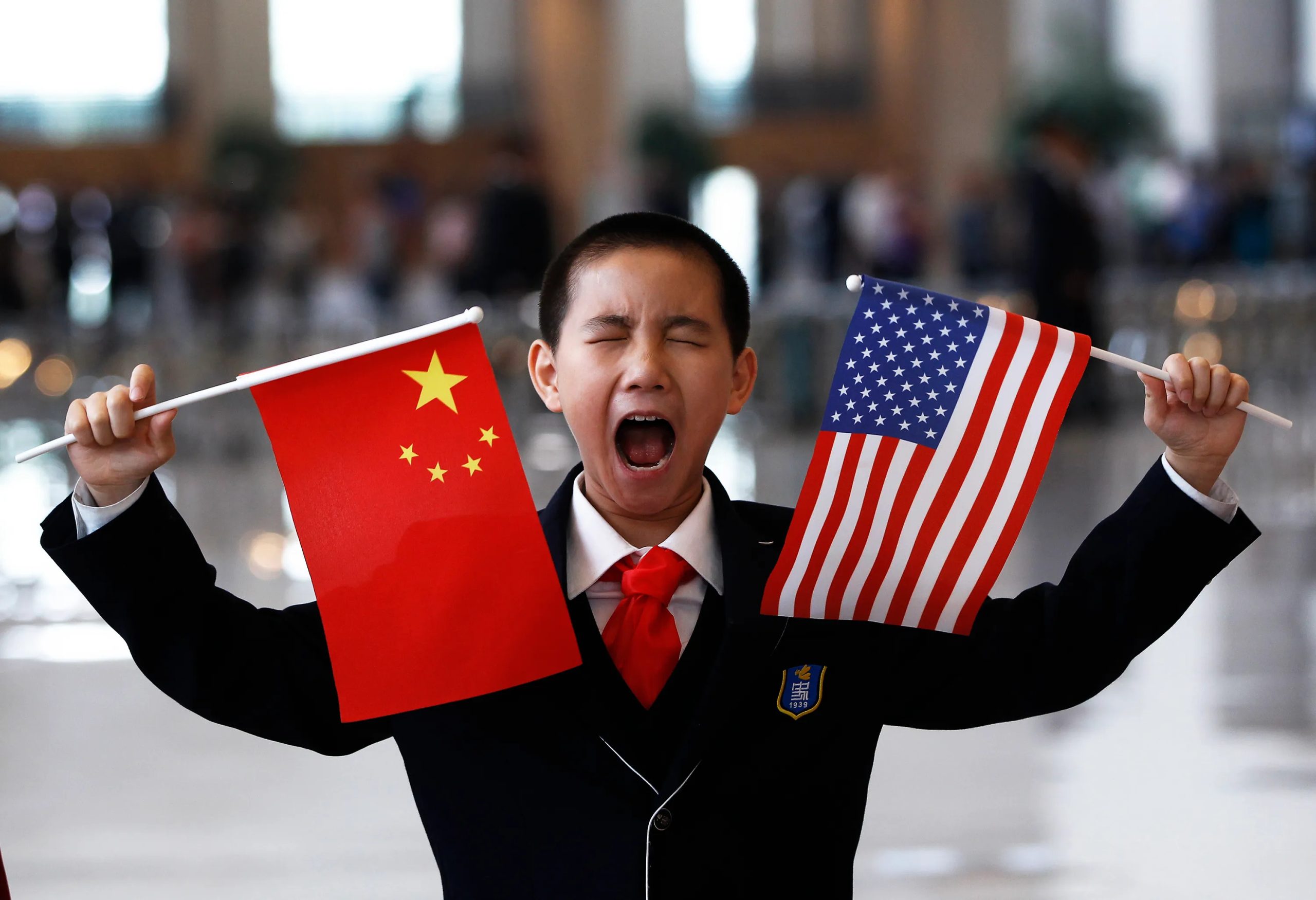 Us china flags held by kid